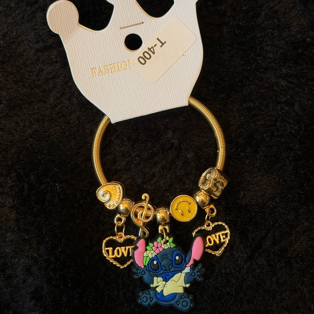 Gold Bracelet with Stitch and Love Charms